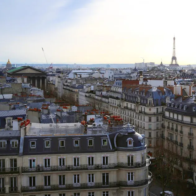 sunset over paris and eiffel tower, With the Paris 2024 olympics france - one of the best places to travel solo in europe