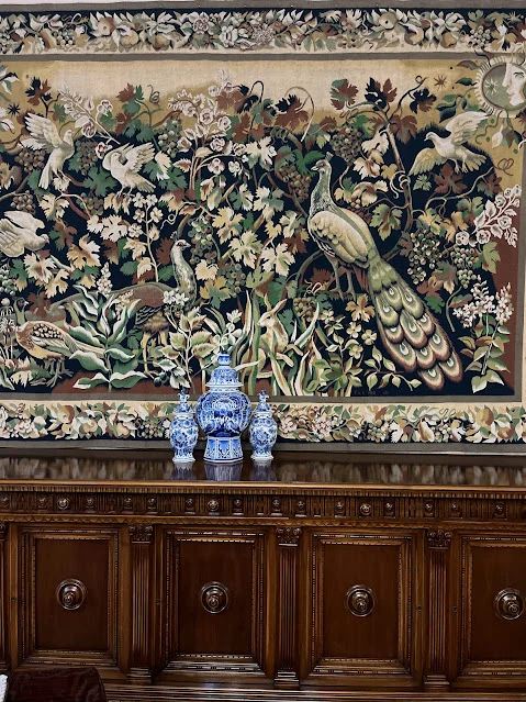 interior of ceausescu palace with china porcelain and peacock tapestry