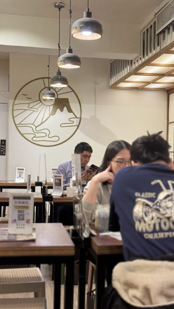 people sitting eating at vegan restaurant in taipei