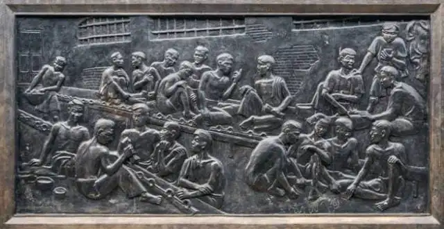 Mural reliefs showing behind-the-scenes of what life was like at the Hoa Lo Prison