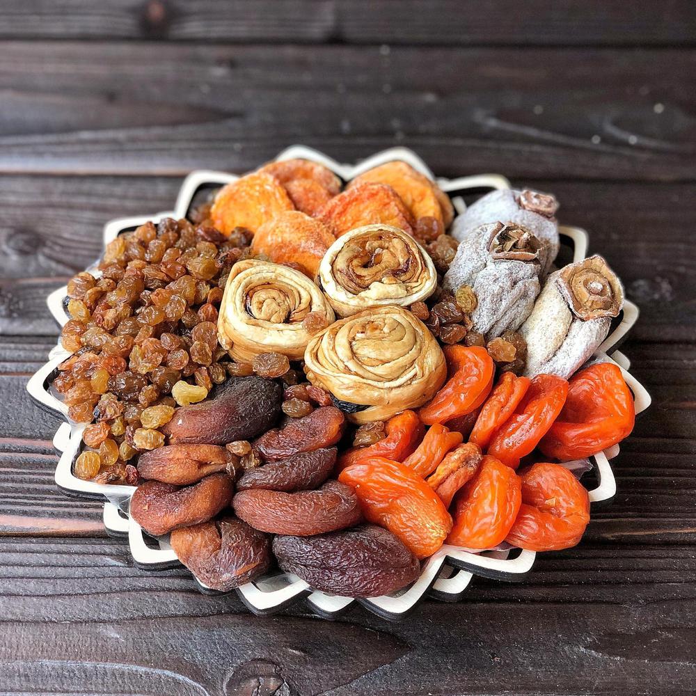 chiri is dried georgian fruit shown here in a white bowl on a wooden table