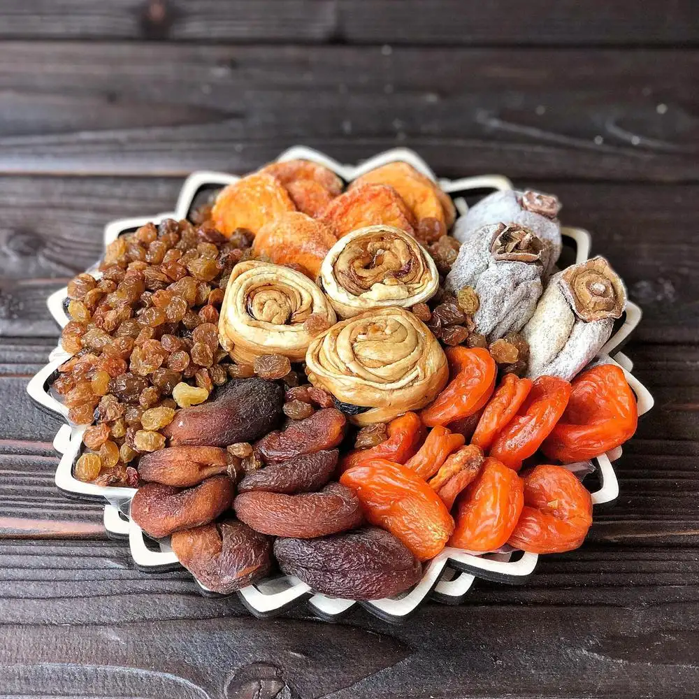 chiri is dried georgian fruit shown here in a white bowl on a wooden table