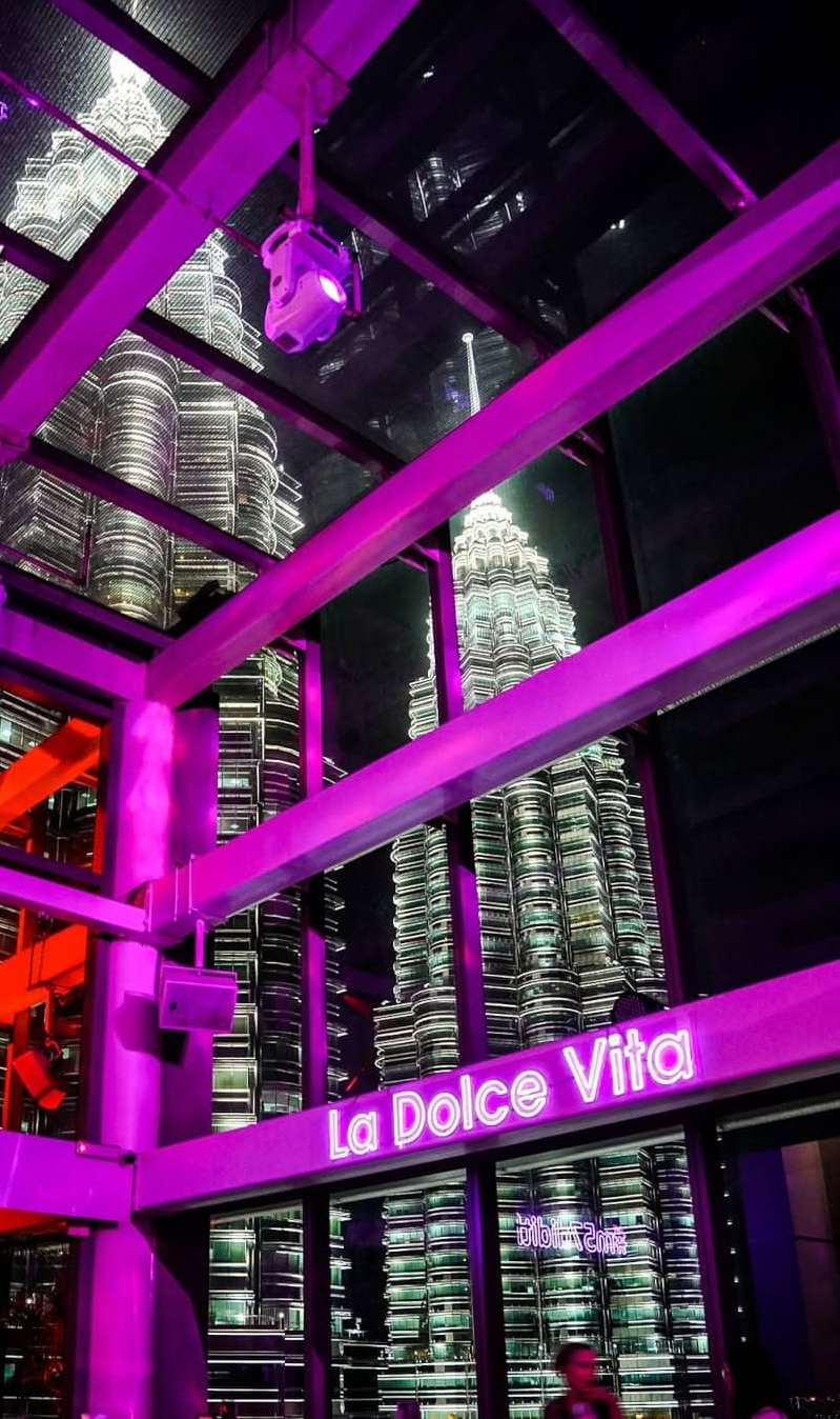Neon signage and skyscrapers