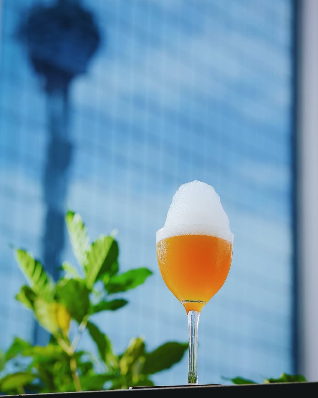 Enjoy a cocktail against KL's metropolitan skyline