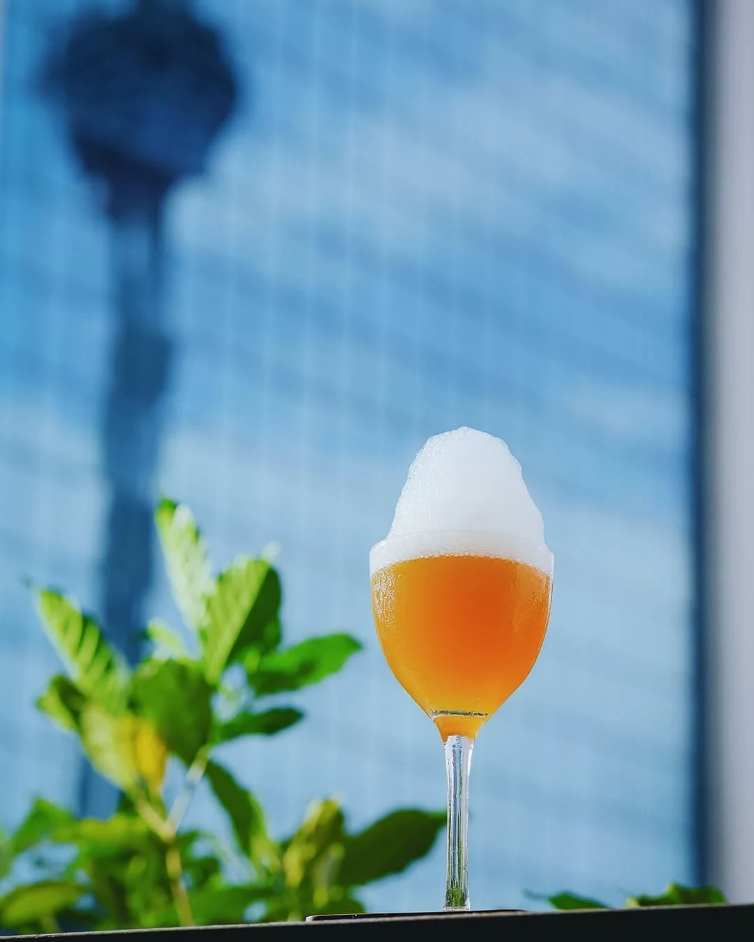 Enjoy a cocktail against KL's metropolitan skyline