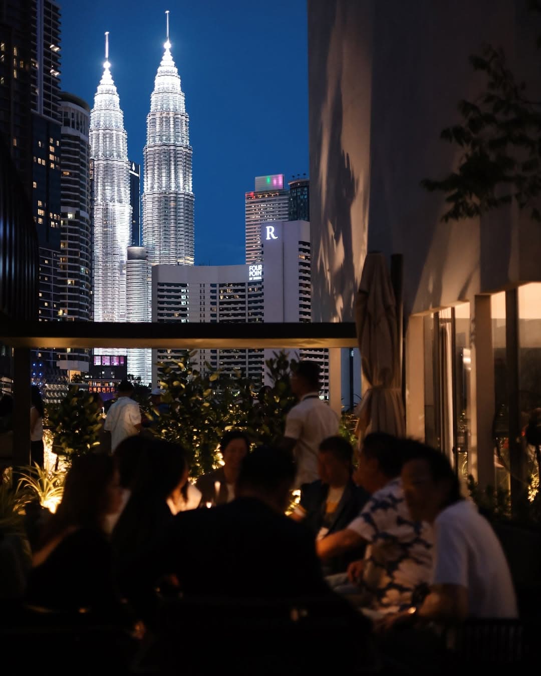 A classy option with veiws of the iconic Twin Towers lit up at night