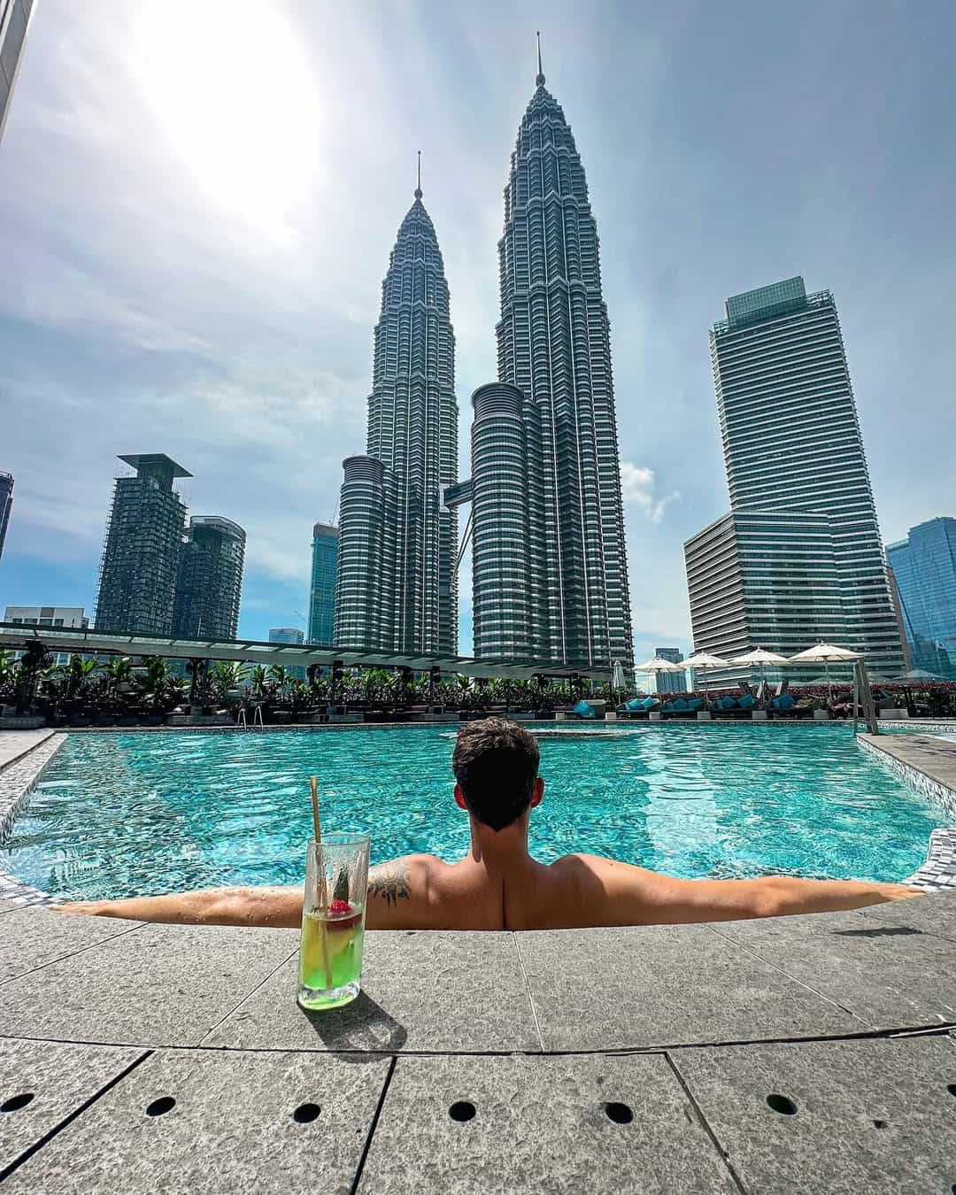 Hang out day or night in the pool with a cocktail and views of the Twin Towers