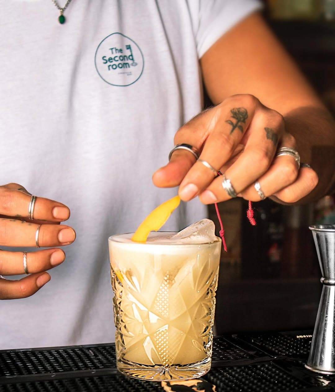 Mixologist making cocktail