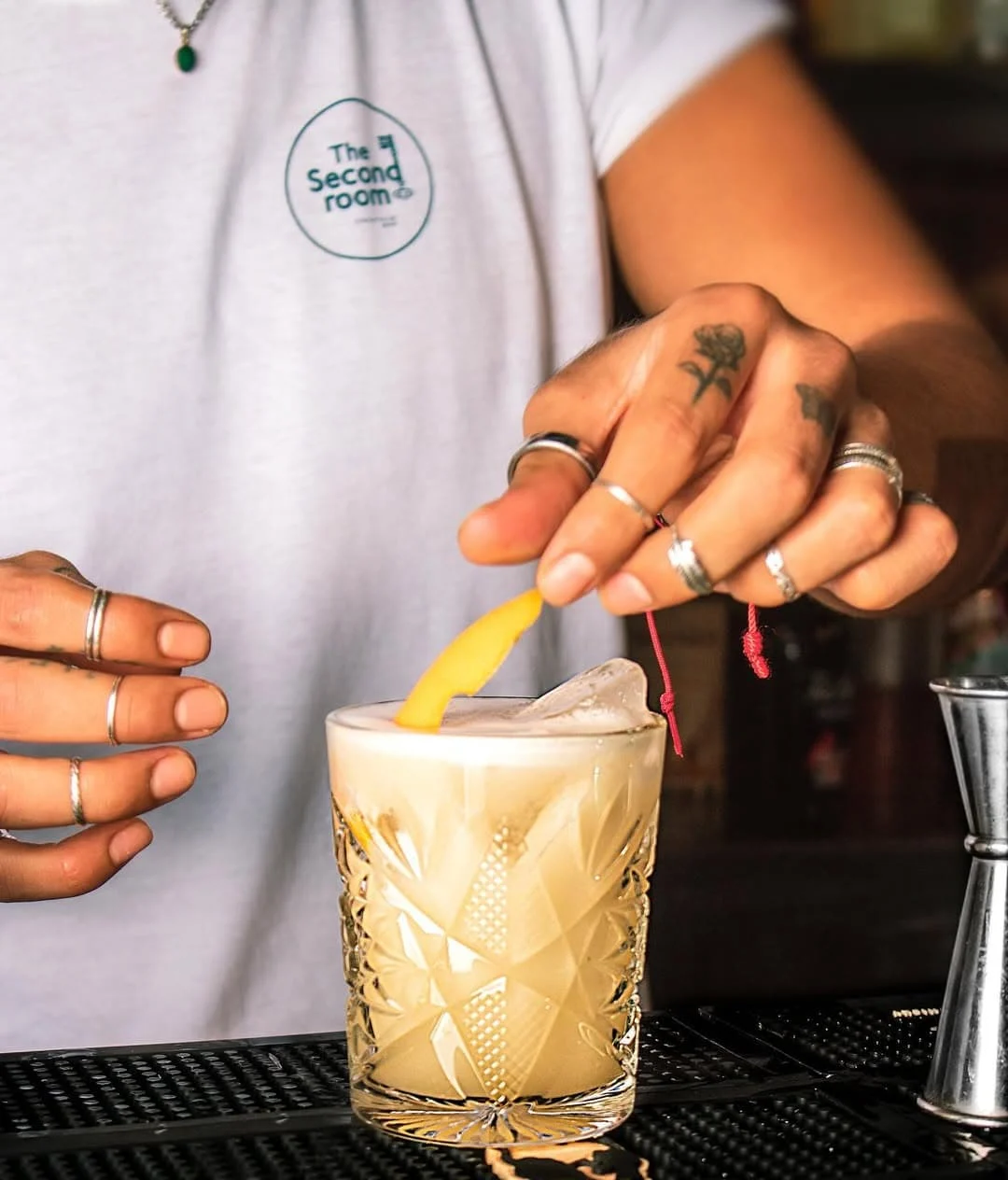 Mixologist making cocktail