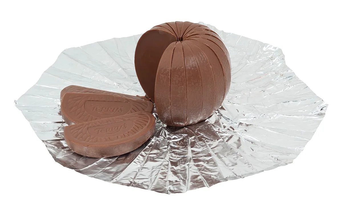 segments of a terry's chocolate orange in their foil wrapper