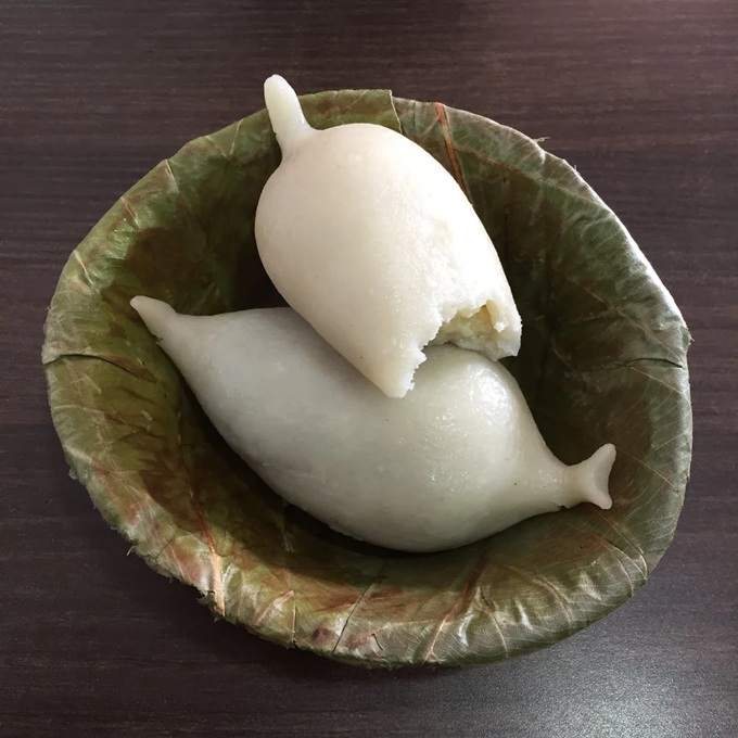 Leaf plate containing yomari