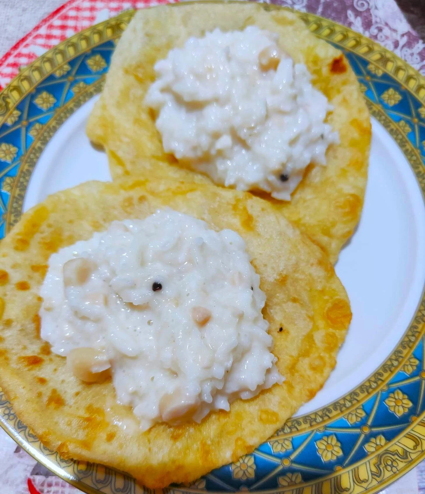 A plate of kheer and puri
