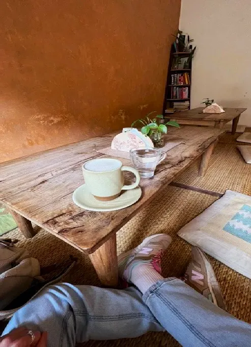 Low table with a cup of coffee 