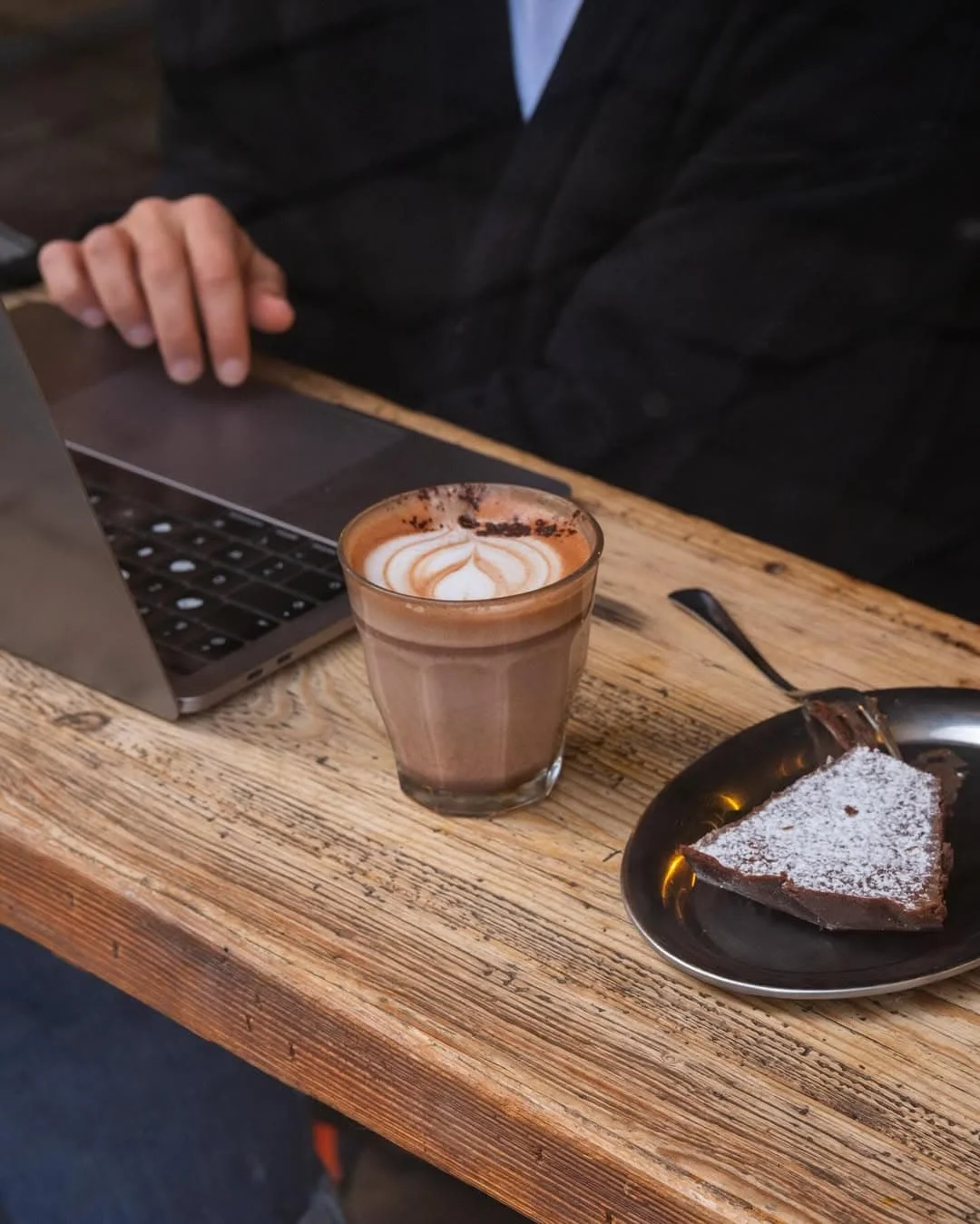 Hot drinks and a slice of cake, a perfect spot for digital nomads