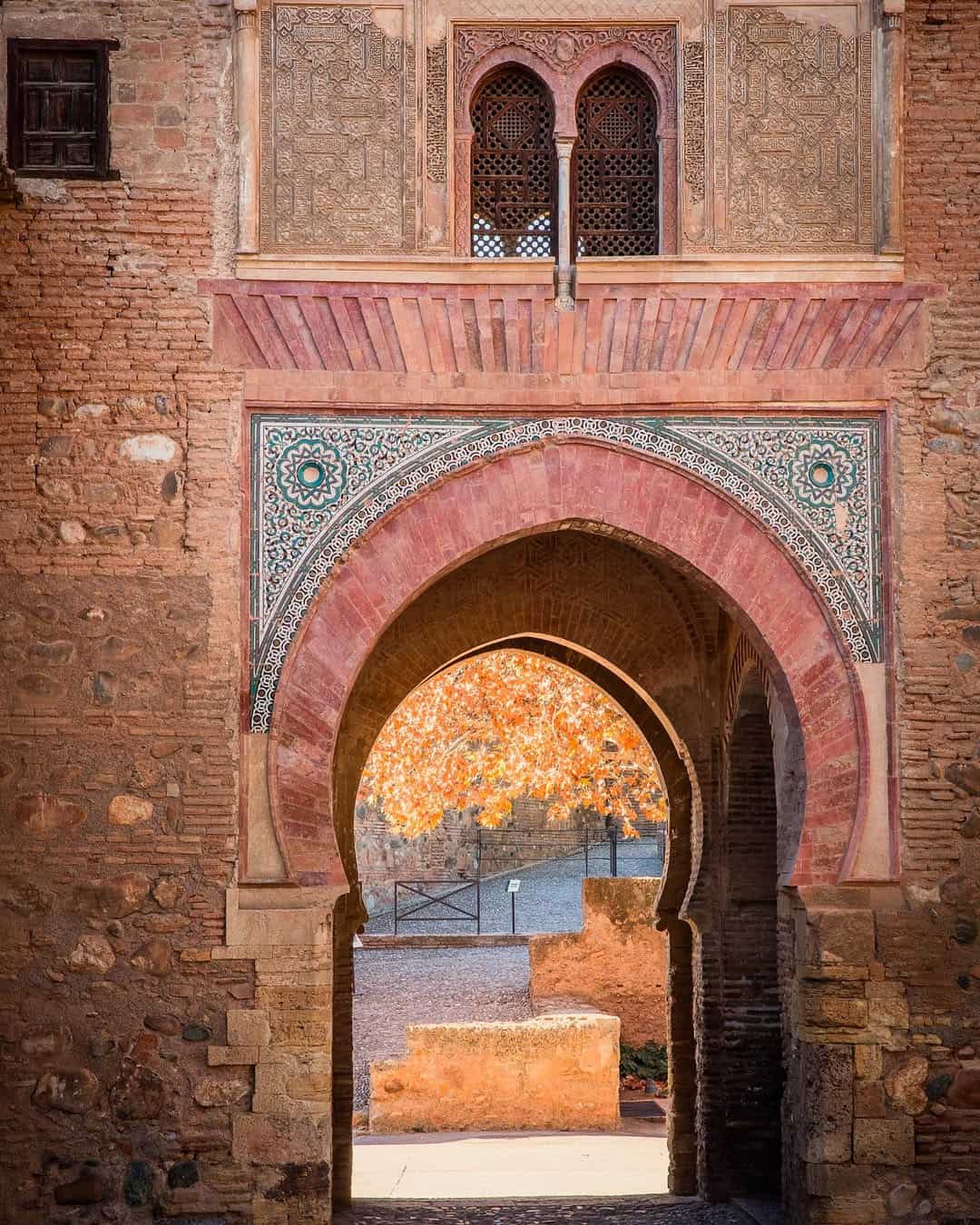 Inside Alhambra fortress/palace, showcasing Nasrid architecture
