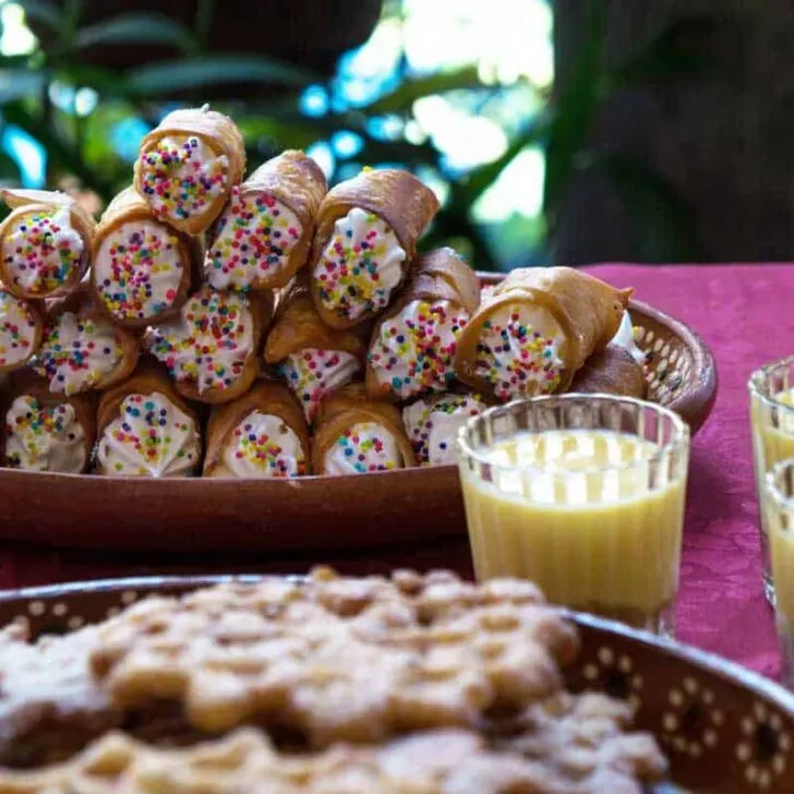Gaznates and other Bolivian desserts at a table