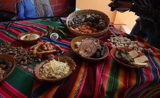 A spread of traditional Bolivian foods on the table