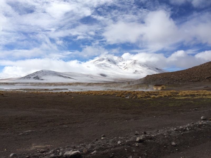 Bolivian highlands seen with mountains and a half-cloudy sky