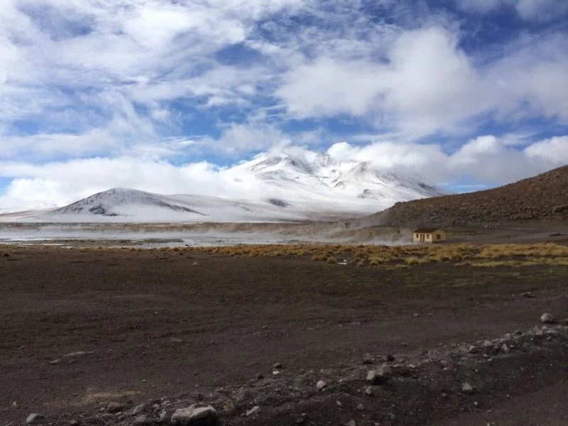 Bolivian highlands seen with mountains and a half-cloudy sky
