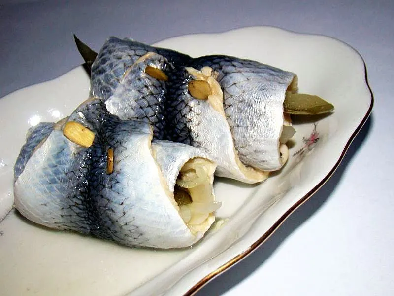 rollmops are rolled pickled herring fillets with a savory filling popular as some of the best street food in berlin