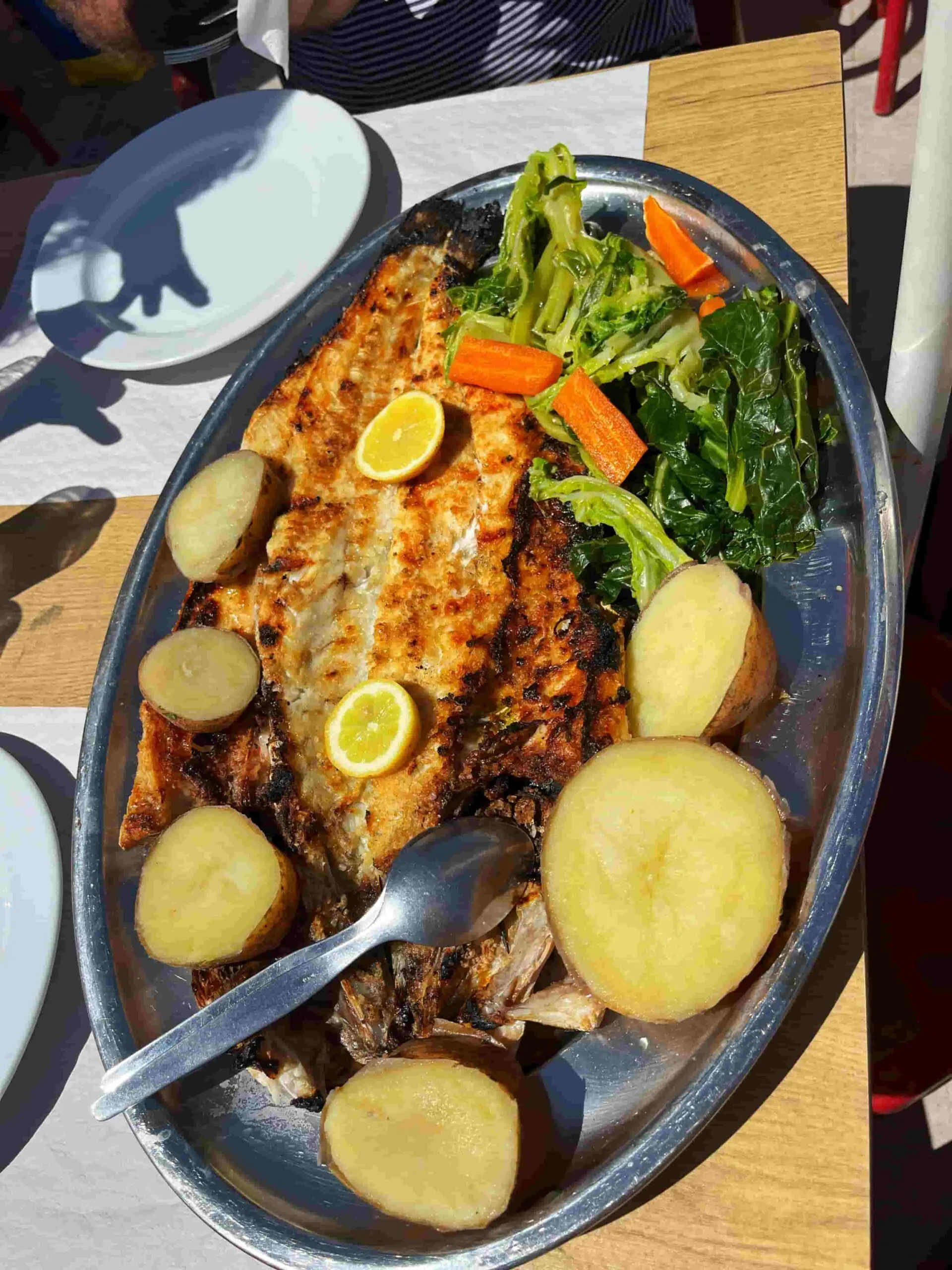 BBQ fish platter big enough for four people at Praia do Castelo