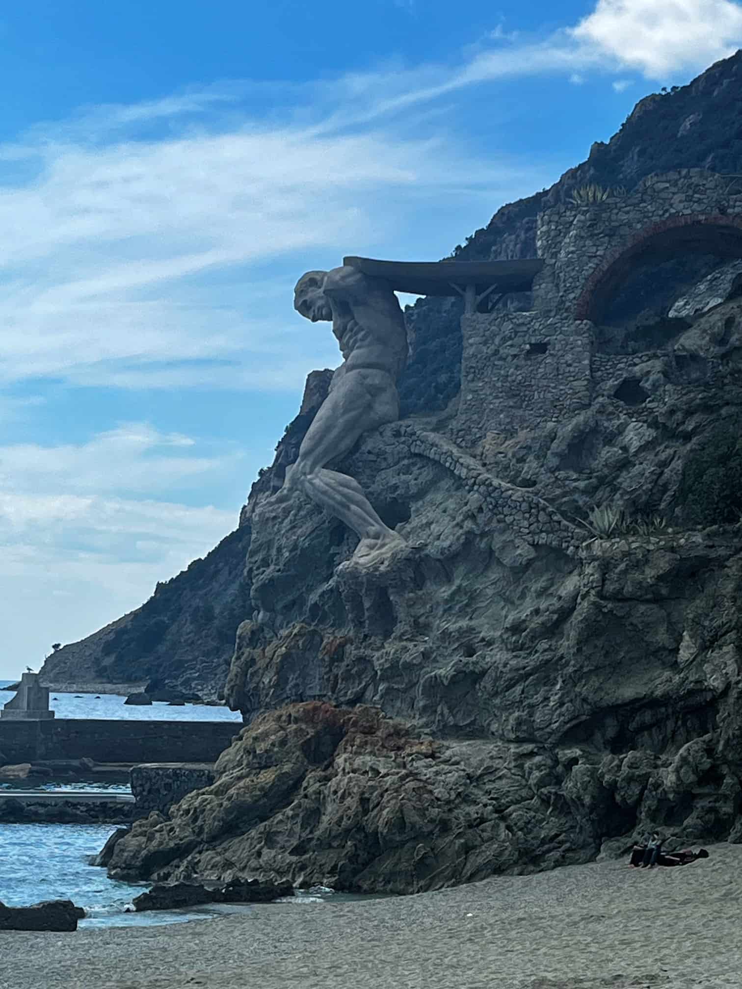 The Il Gigante statue at Fegina Beach