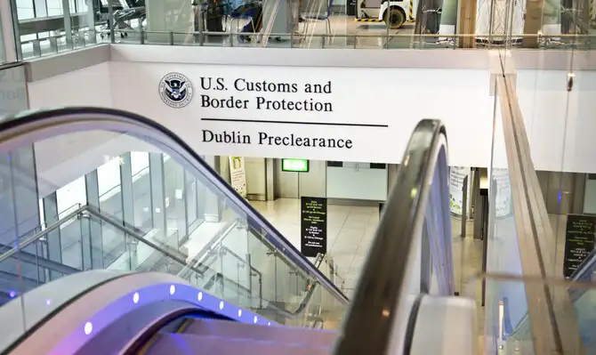 an escalator leading to the united states customs and border protection preclearance facility at dublin airport ireland