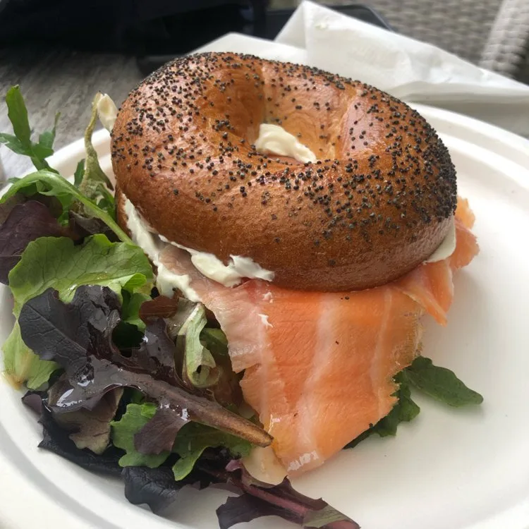 a smoked salmon bagel with cream cheese and salad from tram cafe in dublin ireland