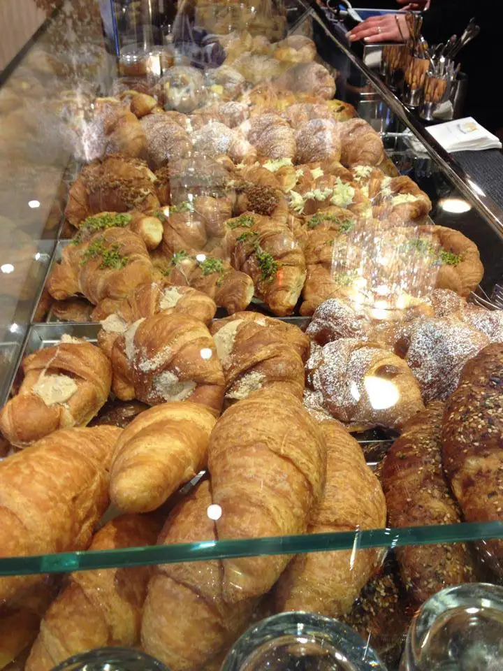 freshly baked pastries on display at espresso bar antico caffe scaletto in bologna italy