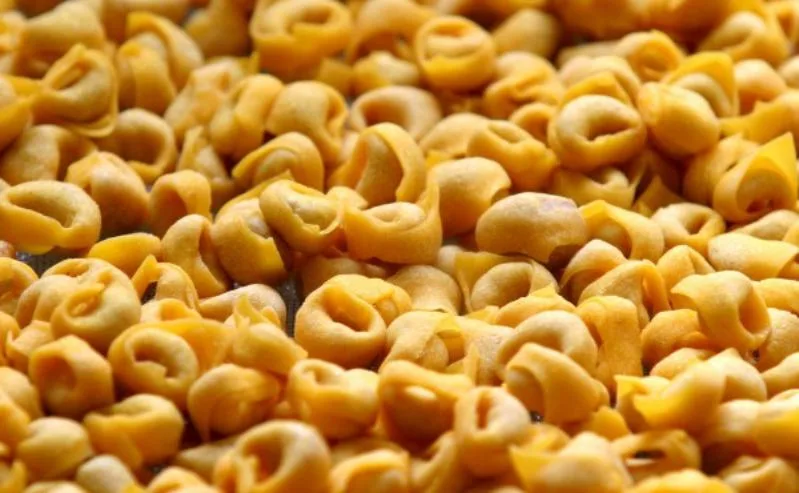 tortellini is pasta stuffed with meat and cheese served in chicken capon broth
