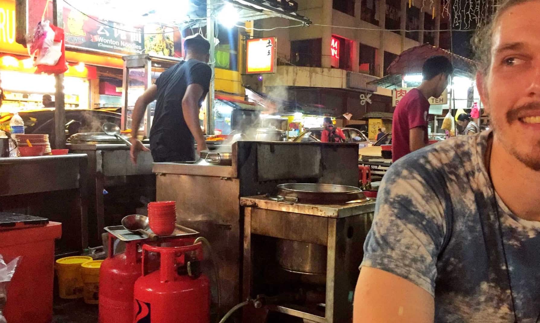 Waiting for our street food in Kuala Lumpur on Petaling Street