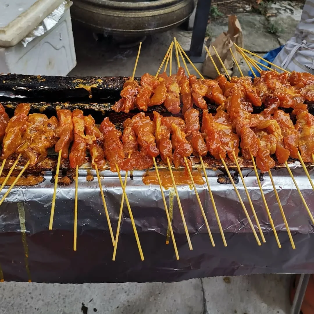 Satay sticks on the grill
