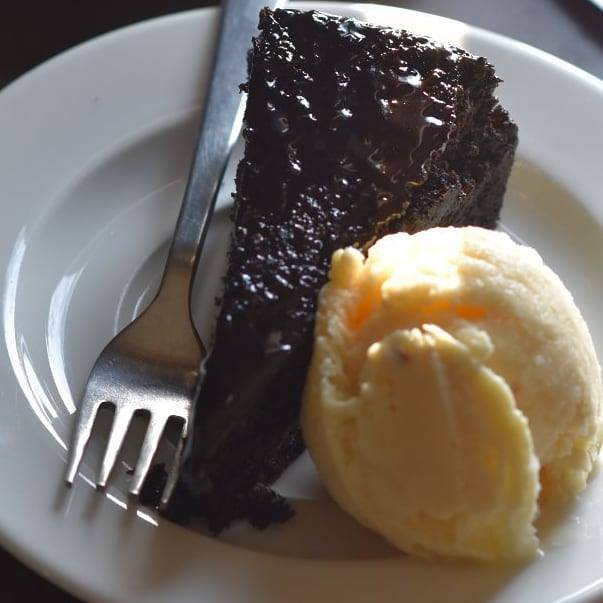 Plate with mud cake and ice cream at a cafe in Kathmandu 