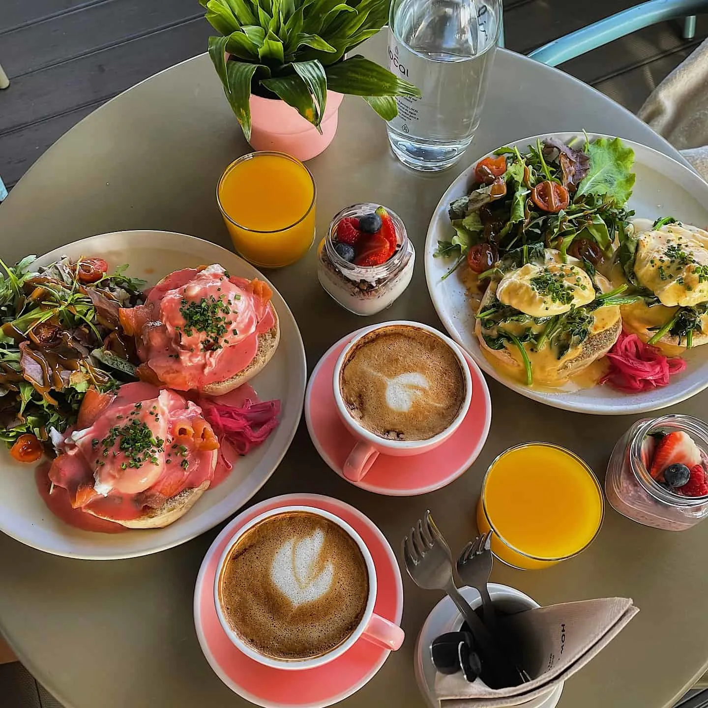 Pops of pink at this breakfast spot from the coffee saucers to eggs bennie sauces