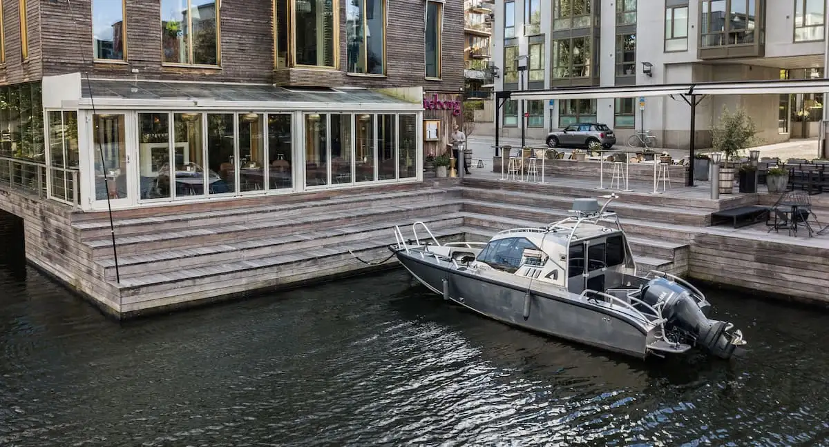 a motorboat on sickla canal outside goteborg restaurant stockholm sweden