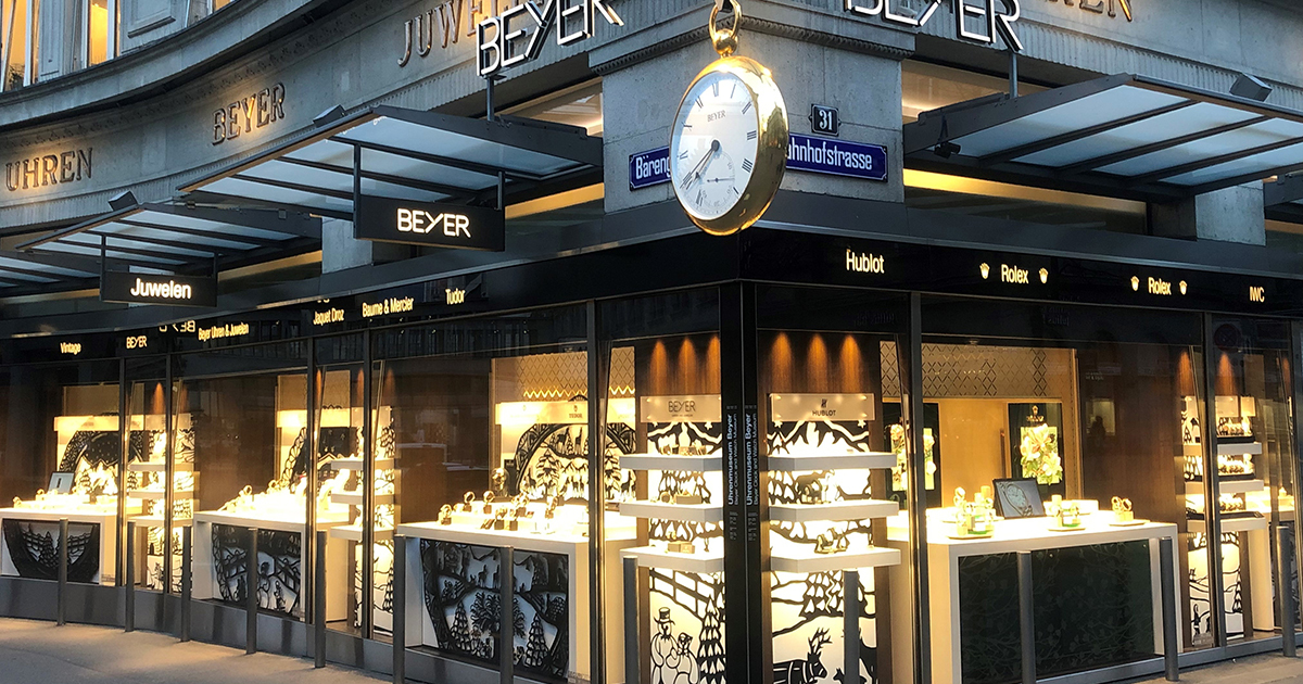 a watch store with a replica swiss watch clock on the exterior in zurich switzerland