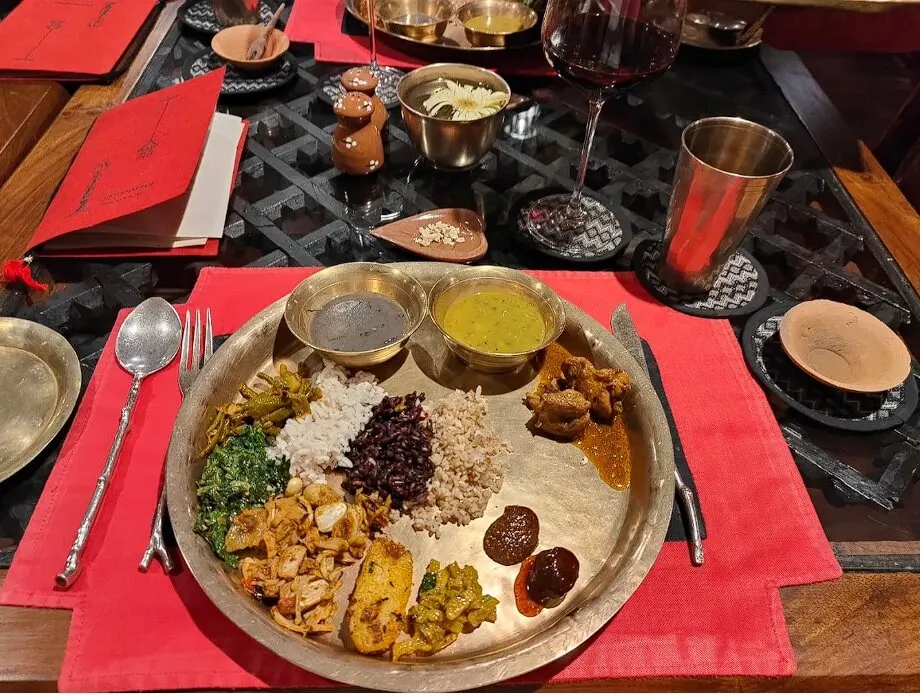 Nepalese curries served on a copper thali plate