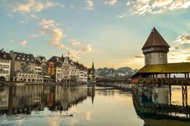 the kapellbrucke is a wooden pedestrian bridge across the river reusse in lucerne switzerland