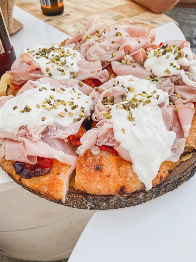 mortadella sausage and cheese on a focaccia 