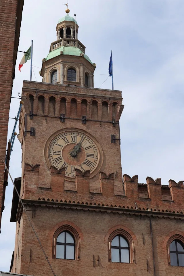 the clocktower of palazzo d'accursio in bologna italy