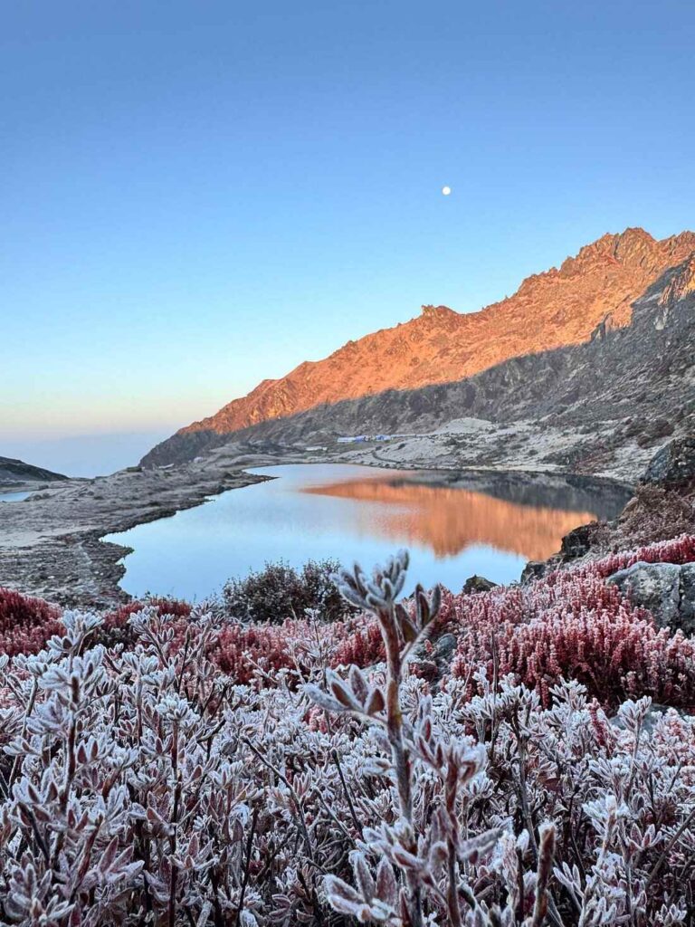 Alpine lake surrounded by mountain peaks