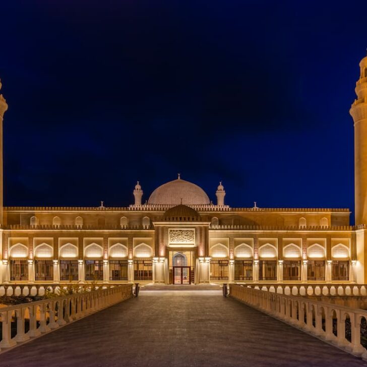 the illuminated minarets of juma mosque shamakhi azerbaijan at night