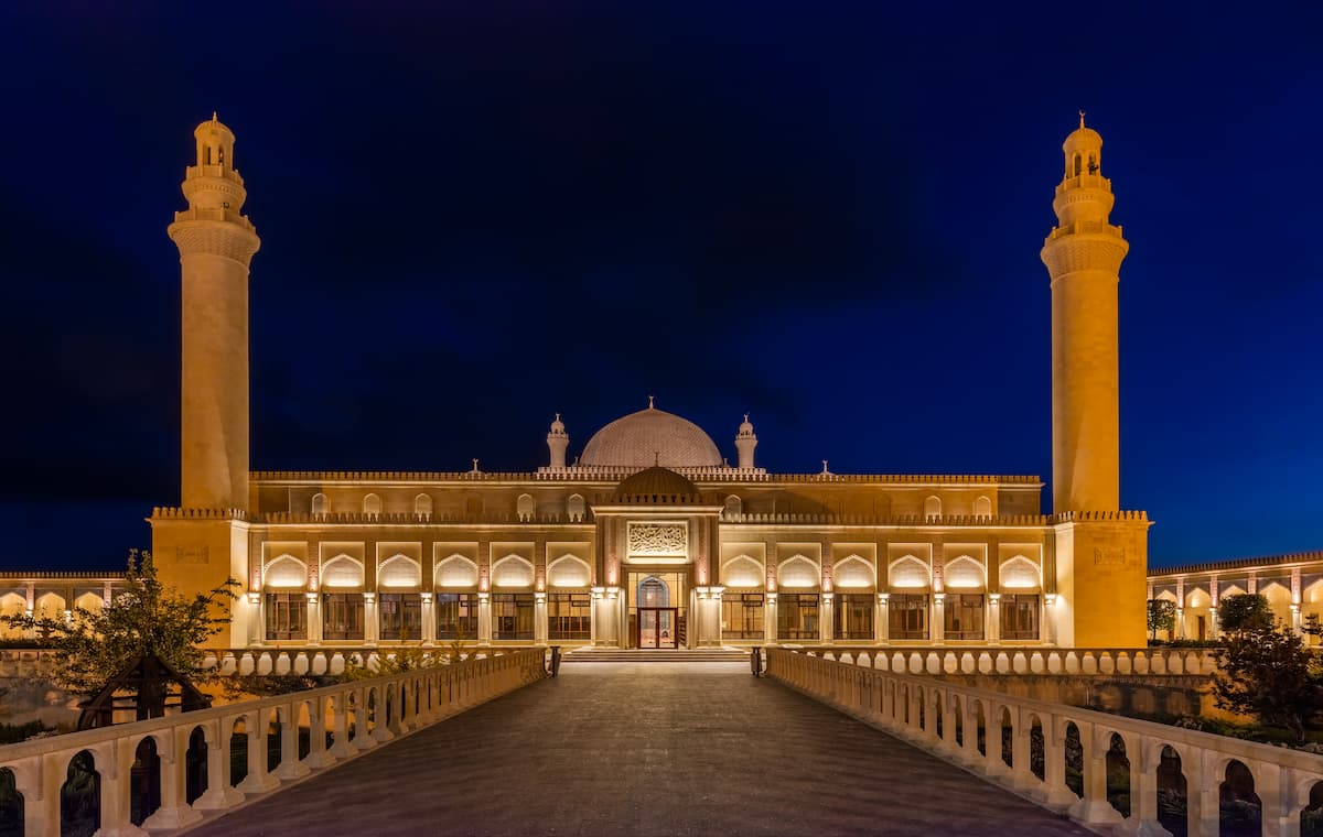 the illuminated minarets of juma mosque shamakhi azerbaijan at night