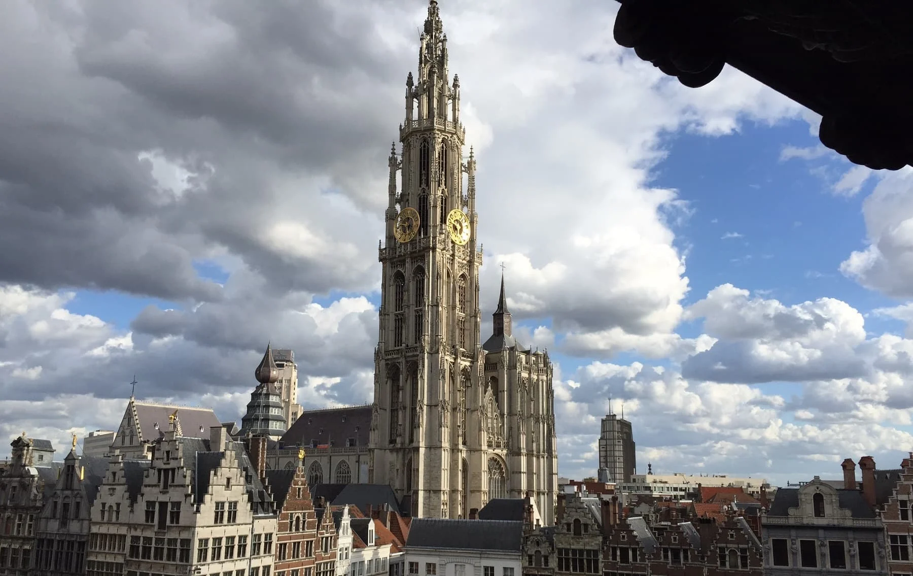 a steeple on a gothic cathedral in antwerp belgium