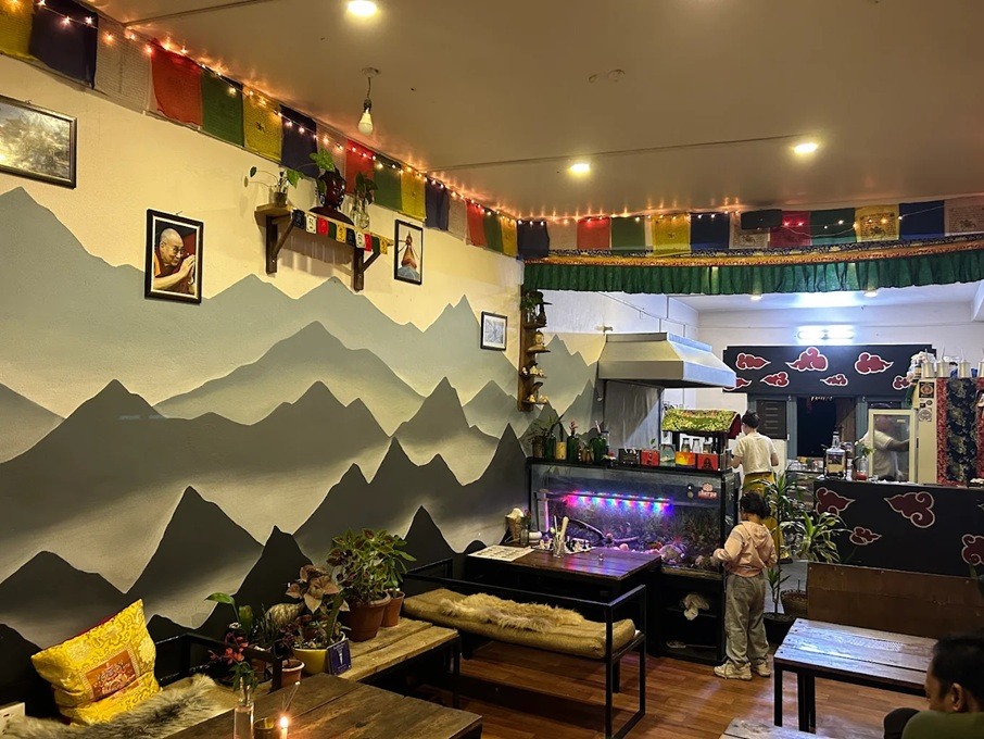 A colorful restaurant interior with wooden tables