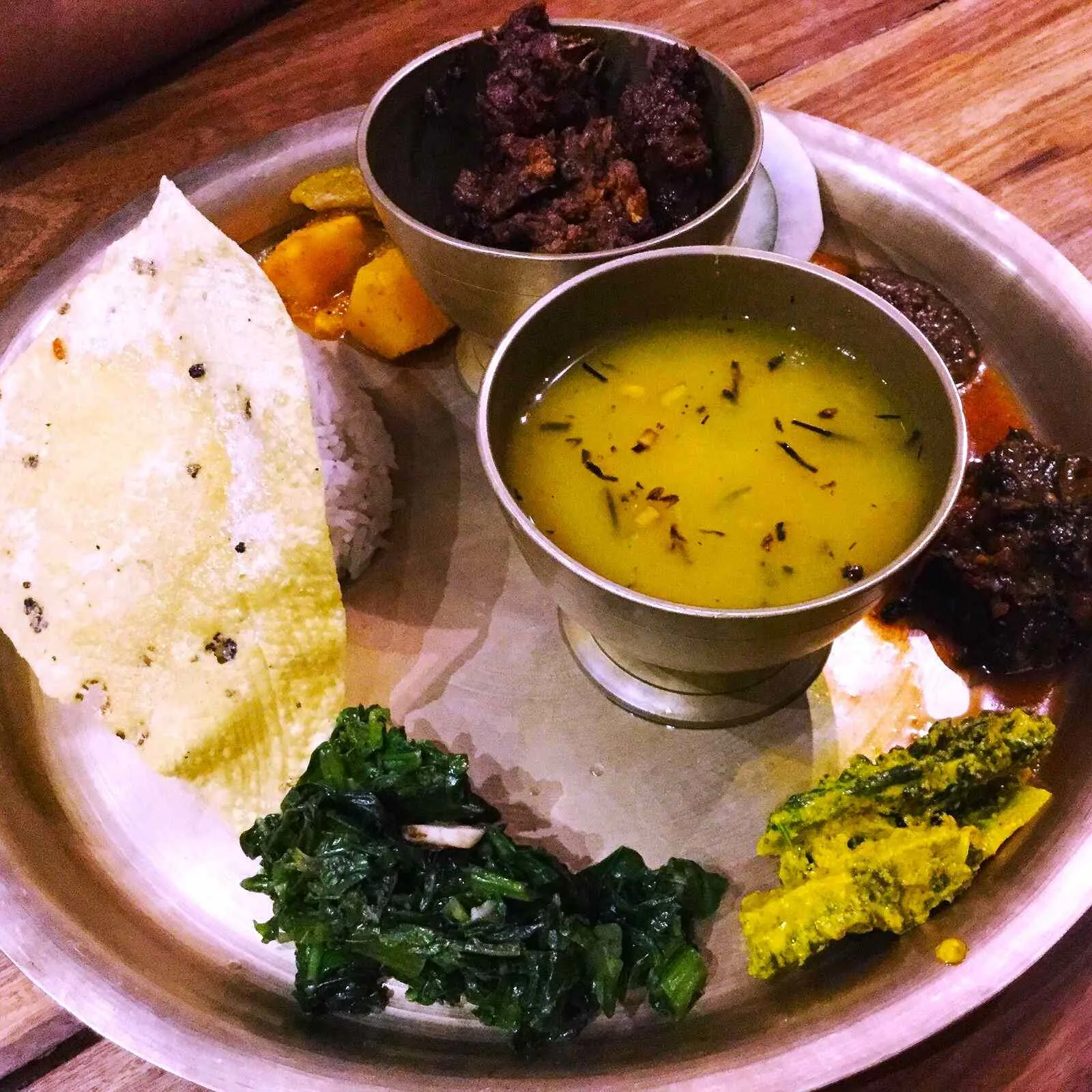 Plate of dal bhat, a popular staple for travelers backpacking Nepal