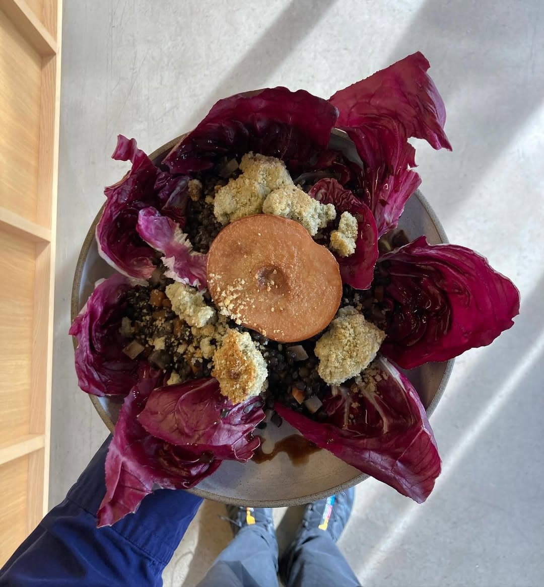 balsamic lentils with radicchio, quince, and a blue cheese crumble