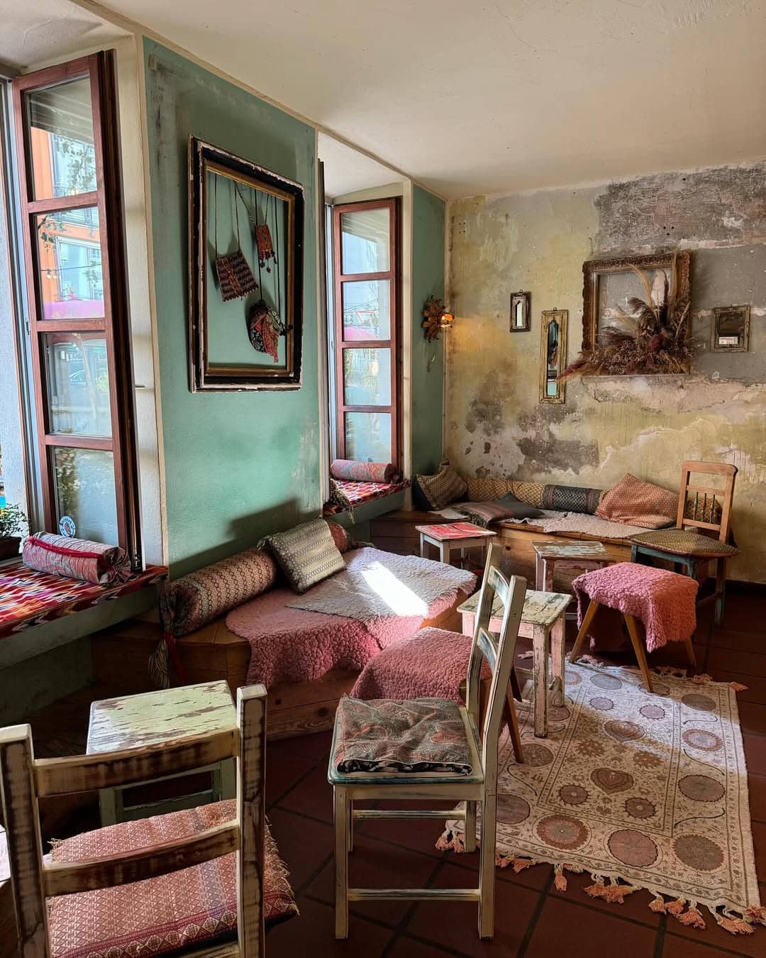 Vintage interiors with exposed walls and mix matched seating