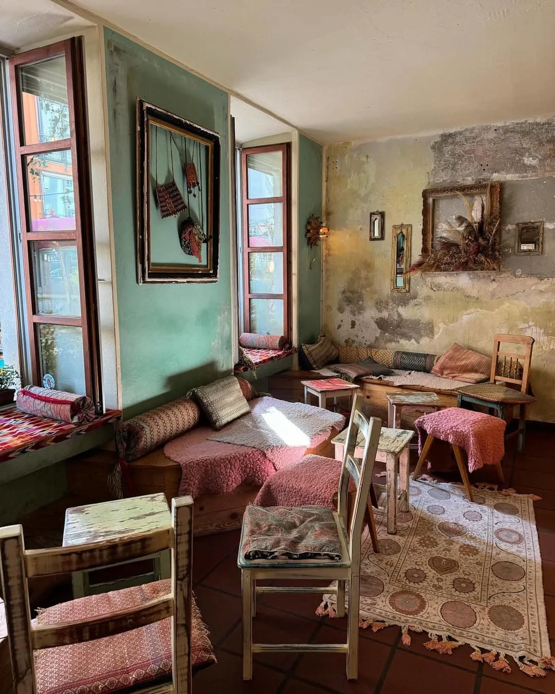 Vintage interiors with exposed walls and mix matched seating