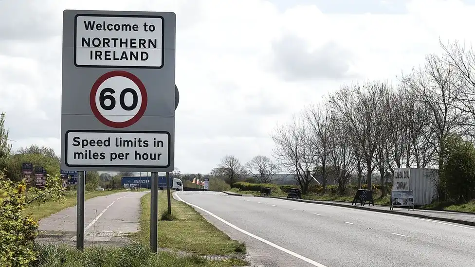 a road sign marks the border between the republic of ireland and northern ireland